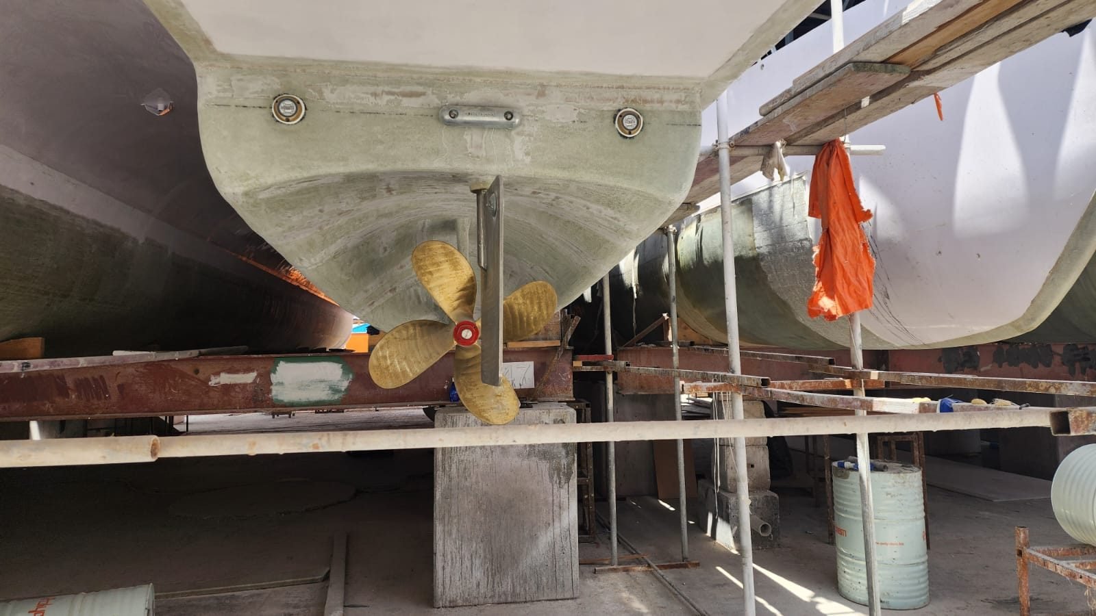 Stern gear installation under a GRP hull, seen from aft