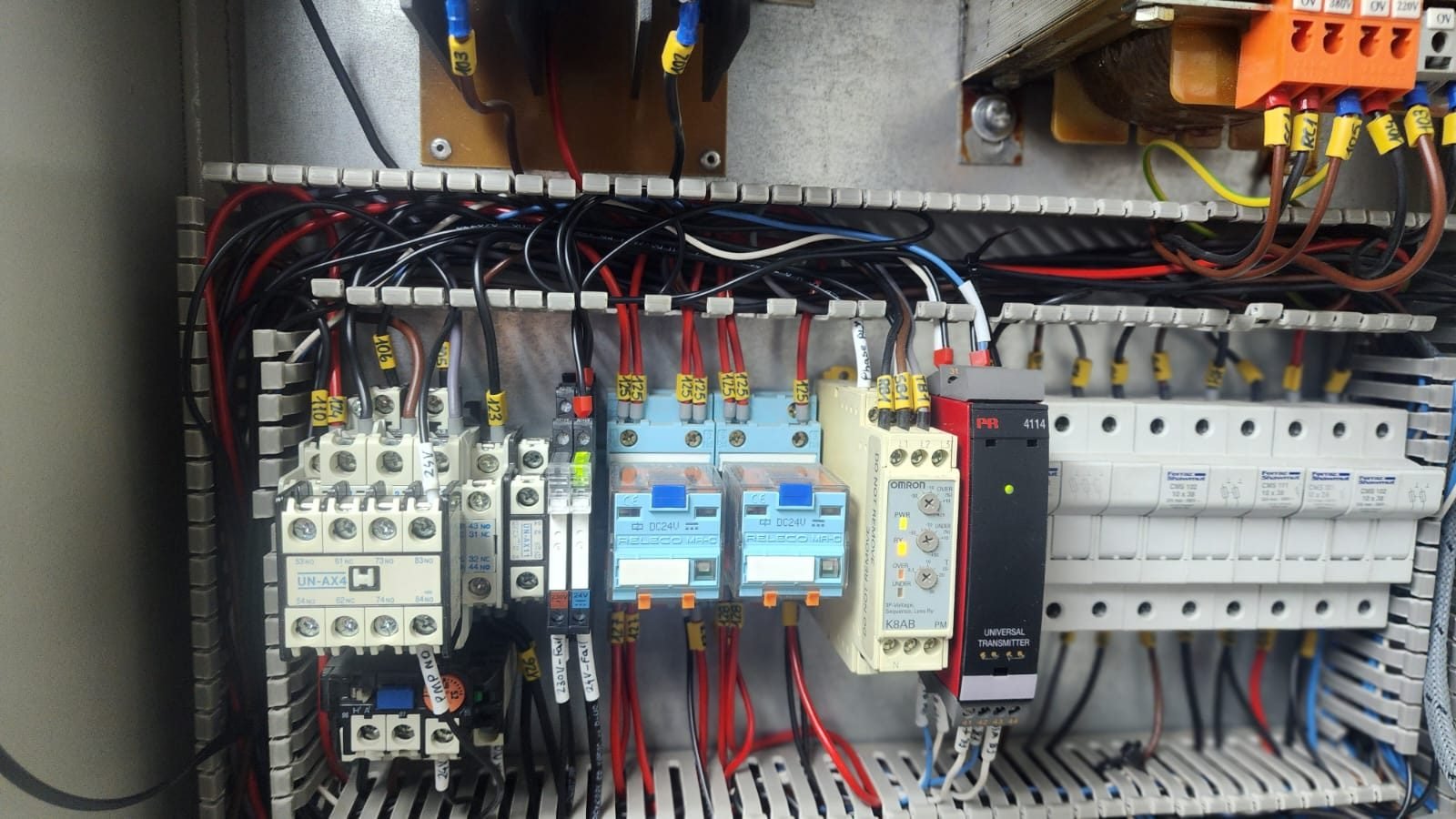 Contactors, breakers and wiring inside a control panel
