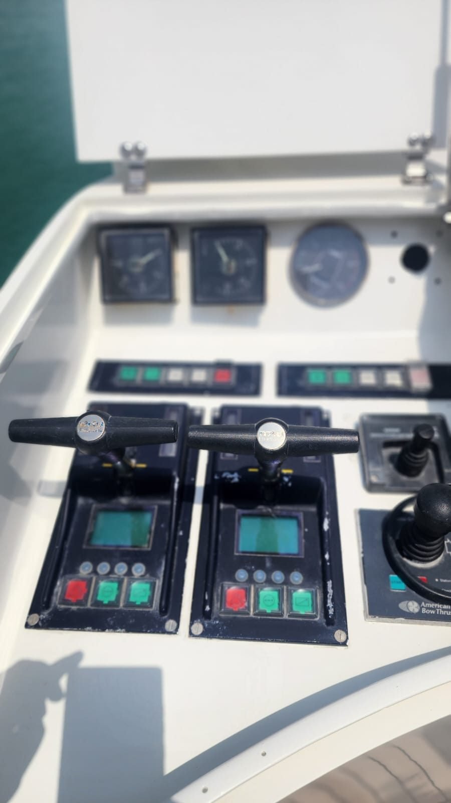Helm console with engine controls and gauges