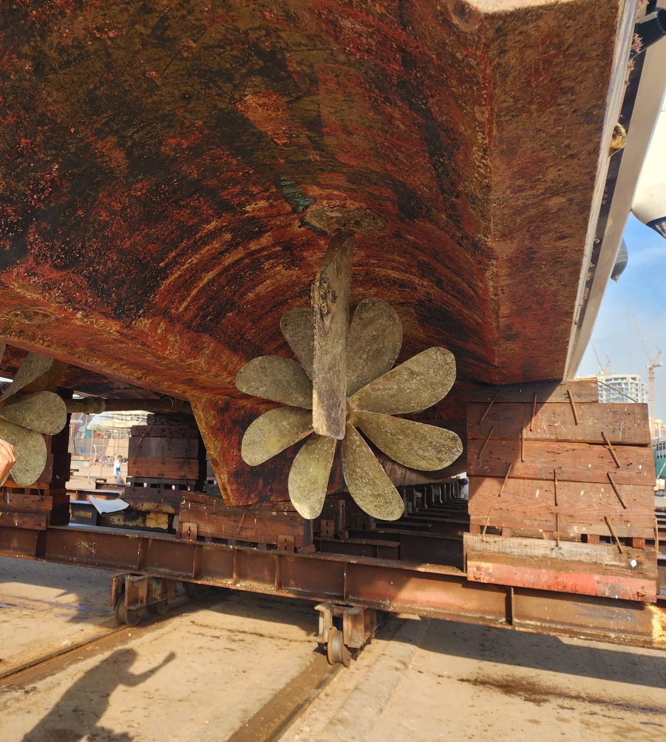 Propellers fitted under a vessel's hull in dry dock