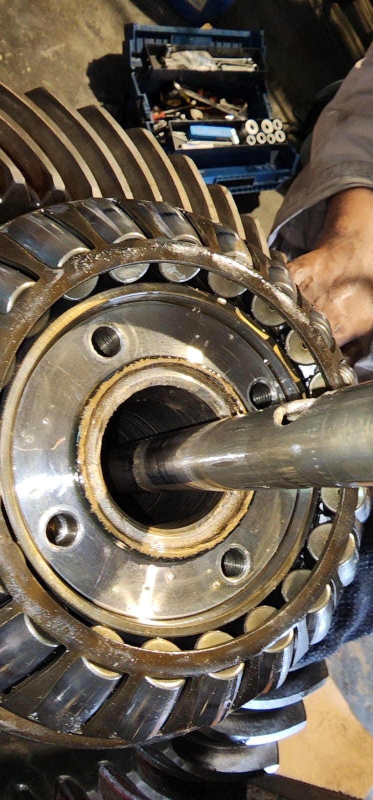 Fitting the shaft through the thruster gear bearings